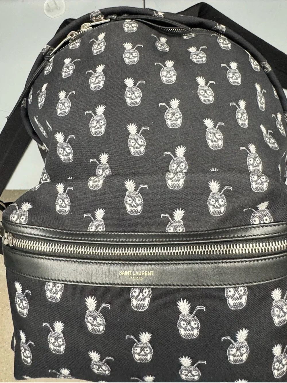 Saint Laurent Black Canvas Backpack with White Pineapple Skull Motif